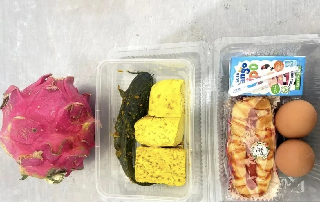 Menu tahu, tempe, dan lele marinasi dengan buah naga, susu, roti yang diberikan oleh SPPG Pamekasan Pademawu Buddagan